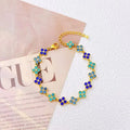 Bracelet en acier inoxydable doré – Fleurs & Cristaux